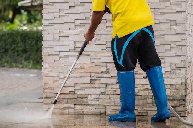 outdoor-floor-cleaning-with-high-pressure-water-jet_30478-1977