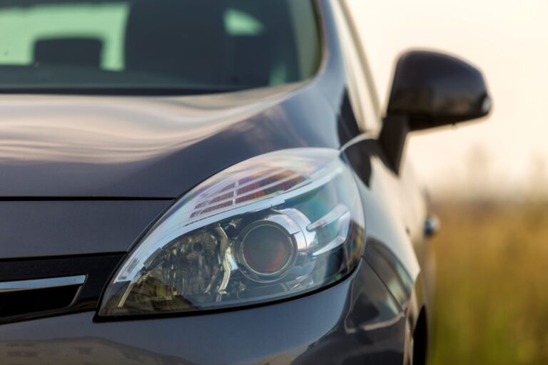 close-up-detail-part-of-black-shiny-car-headlight-2026-01-07-02-06-09-utc