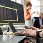 programmer-typing-codes-on-computer-at-table-2026-01-08-07-35-02-utc